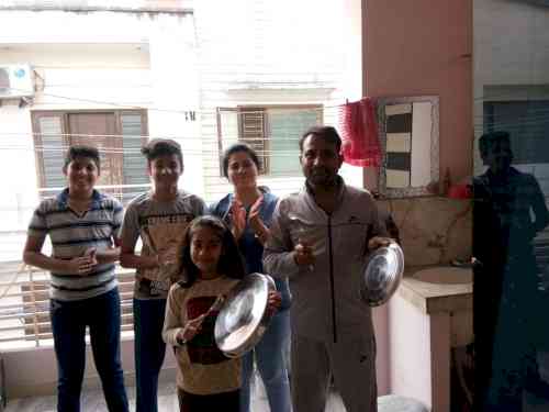 People on Sunday evening expressed appreciation for medical and other staff who are on the forefront of the battle against the coronavirus across the country. They did ringing of bells, beating of metal plates and clapping. This picture was taken in Ludhiana at 5pm on March 22, 2020.