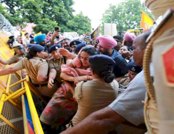 Akali Dal activists seek bribery case registration against Punjab CM's wife 