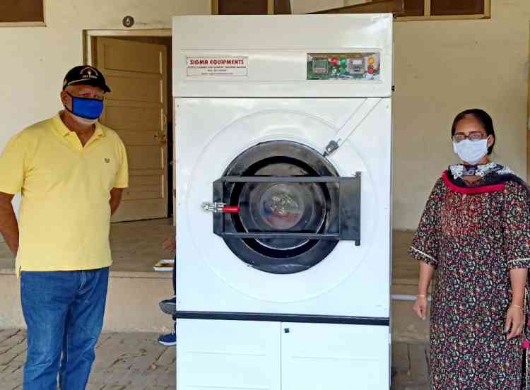 Laundry machine for washing bedsheets, pillow covers and bedding installed at isolation centre