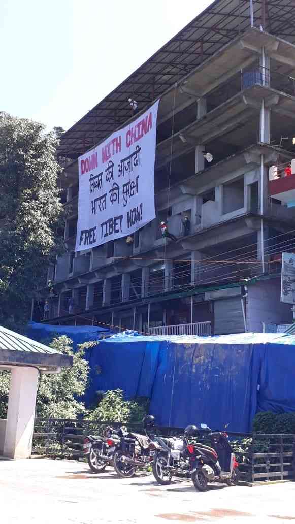Giant protest banner unfurled in Dharamshala by SFT
