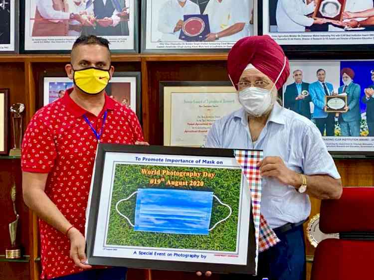 VC PAU launches unique portrait by High Court Lawyer Harpreet Sandhu depicting importance of mask on world photography day 