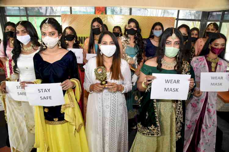 Students’ fashion show highlights social distancing and wearing masks