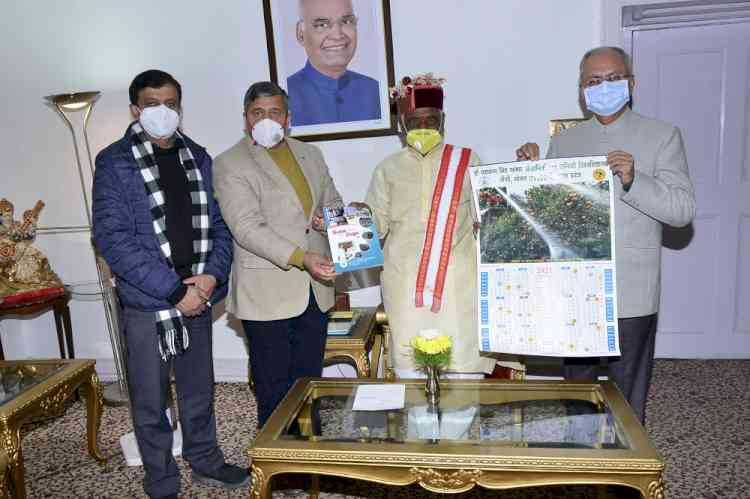 Guv releases Kisan handbook and calendar of Nauni varsity