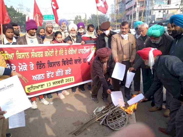 Left parties burn copies of three farm laws to observe Lohri