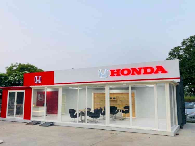 Recycled container showroom designed by Veepul Kaushik for Honda Group