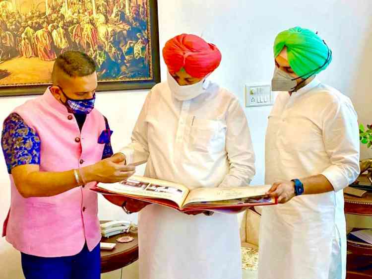 Health Minister Punjab Balbir Singh Sidhu acknowledges coffee table book depicting spiritual journey of Guru Teg Bahadur Sahib