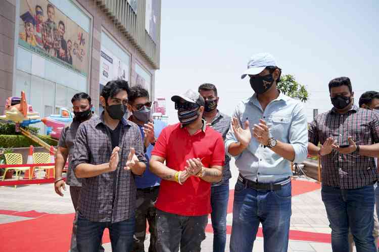 Bollywood Singer B Praak, IAS Abhishek Singh and TV Host Karan Singh Chhabra launch drive through vaccination in Mohali