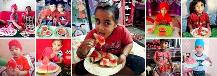 Kids enjoy water melon party