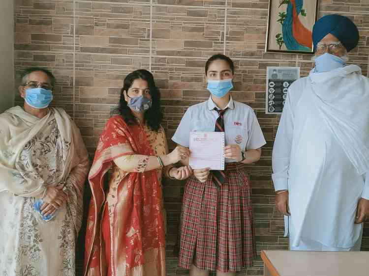 DIPS student honored with merit certificate by CBSE