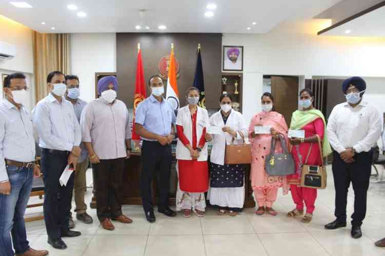 DC felicities health team for vaccinating all 18 Plus residents in Bhikhi Village