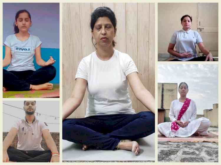 Teachers, parents and students did yoga on International Yoga Day at Innocent Hearts