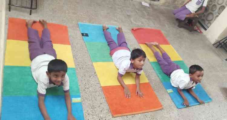 Yoga land India donates their kids mats