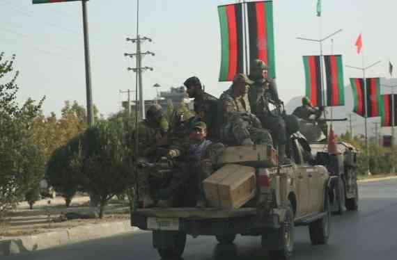 Protests across Afghanistan holding national flag