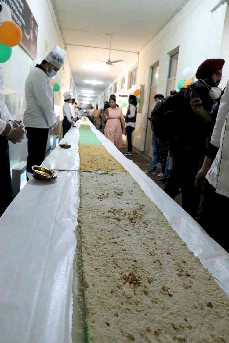 CT Group attempts Limca Book of Records by making 208 ft longest coconut burfi