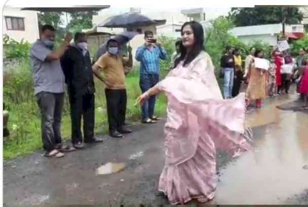 Bhopal women hold catwalk on potholed road to draw govt's attention