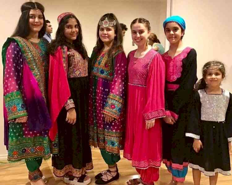 Afghan women protest Taliban's hijab diktat by sharing photos in colourful dresses