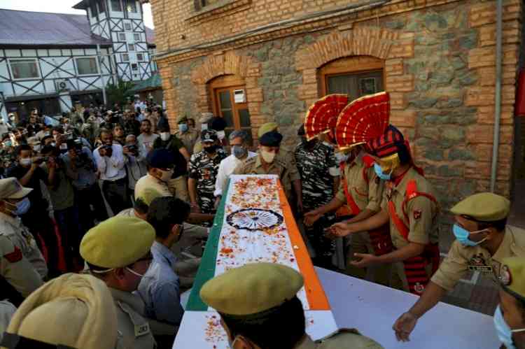 Huge turnout at police officer's funeral reminds one of Kashmir's complex reality