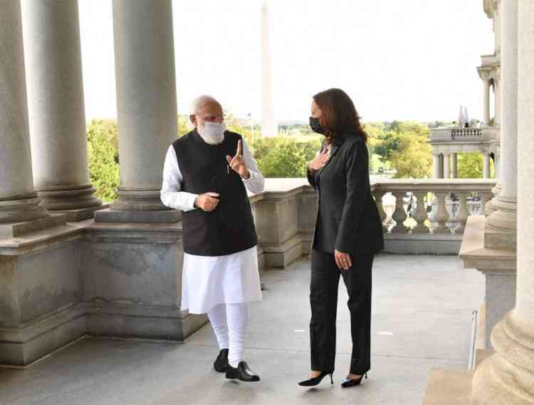 India waiting to welcome you, Modi tells Harris