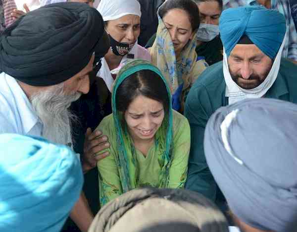 Sikh mourners seek death for killers of civilians in Srinagar