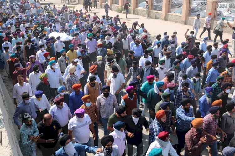 Sikh community in Kashmir holds funeral procession for slain principal