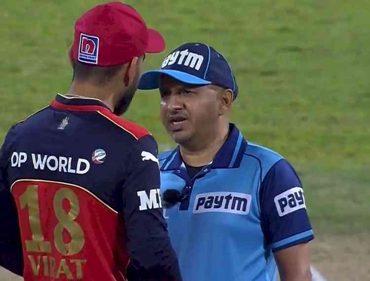 Kohli loses cool at umpire Sharma; square-leg umpire intervenes