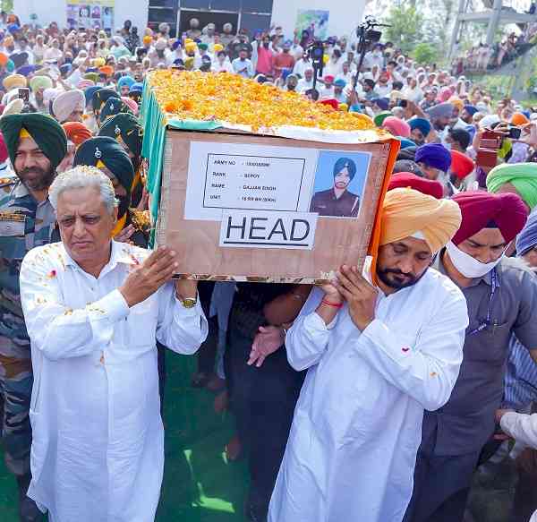 Punjab CM lends shoulder to martyred soldier's bier