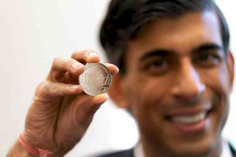 UK unveils coin on Mahatma to mark Diwali