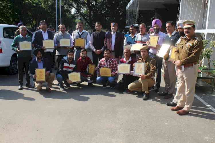 PU VC felicitates employees for commendable work