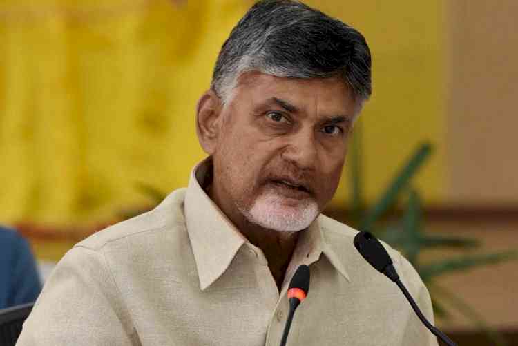 TDP legislators walk to Andhra Assembly to demand cut in fuel tax