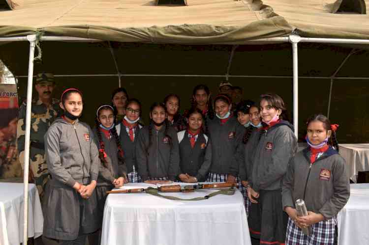 Group of students witness weapons display
