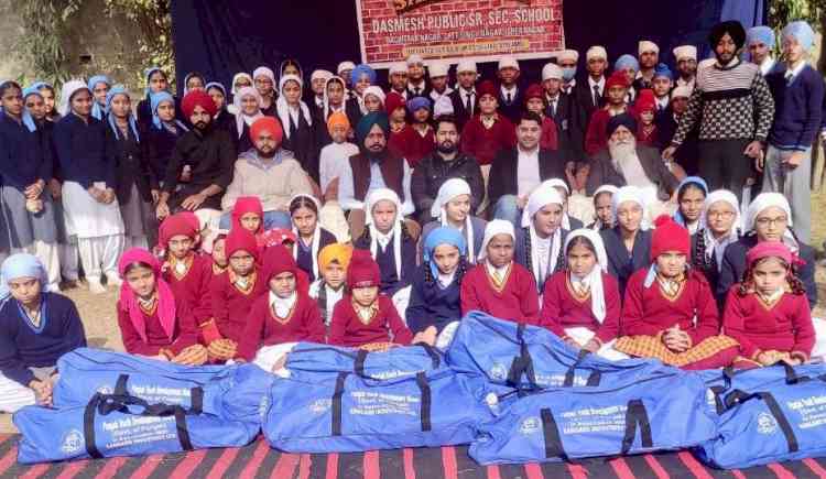 PYDB chairman distributes 20 sports kits to students of Dashmesh Public Senior Secondary School 