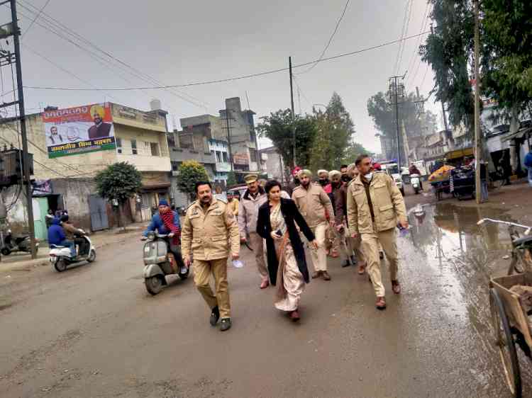 Flag March along with police counterpart and police force in vulnerable areas