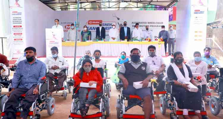 Muthoot Finance donates fully automatic electric wheelchairs to persons with special abilities