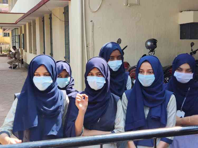 Hijab row: K'taka colleges reopen amid tight security