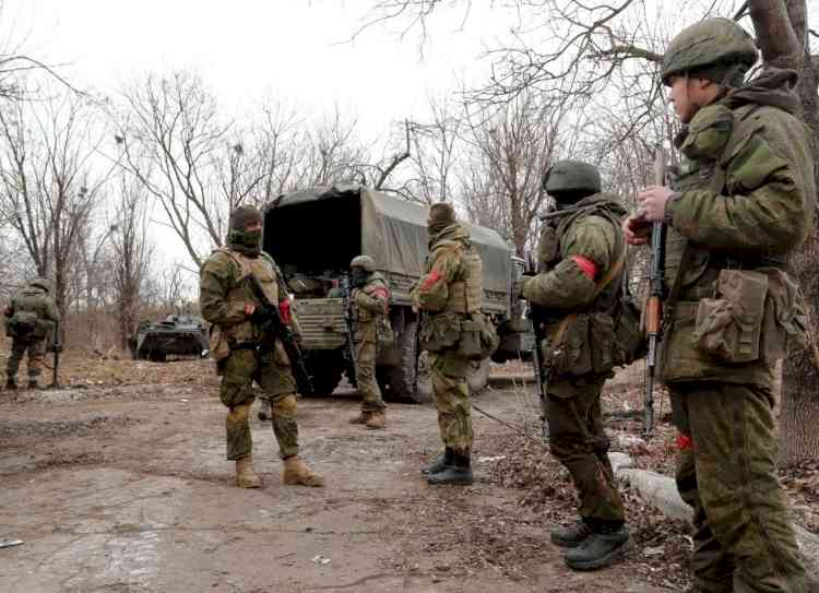Russian forces hold fire, open humanitarian corridors in Ukrainian cities