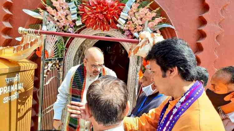 Amit Shah offers puja in Tripura temple, inaugurates silver made door