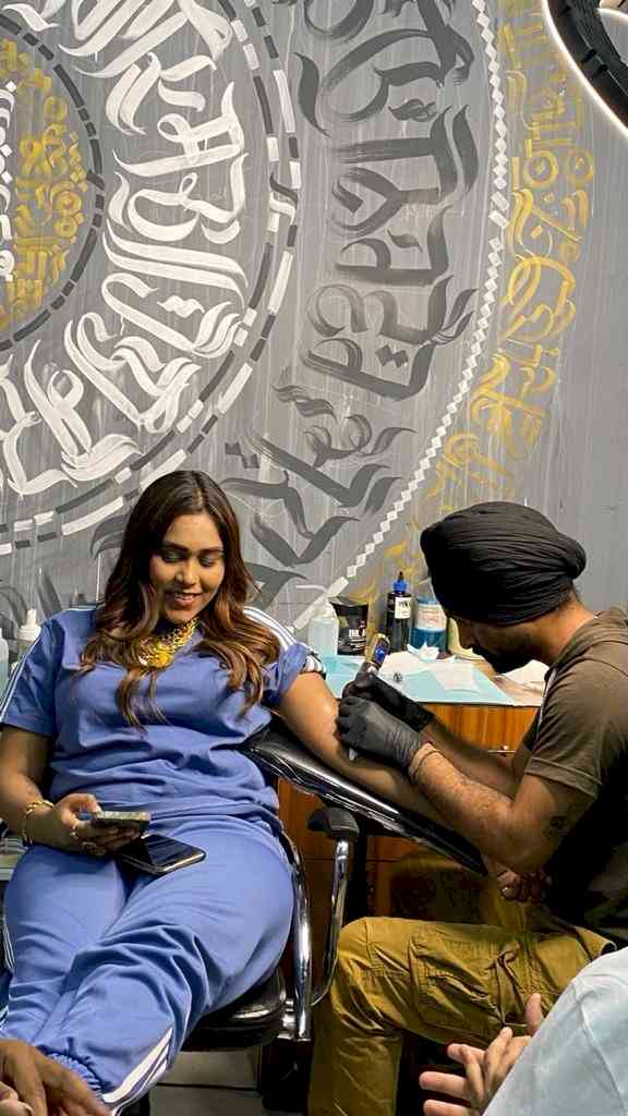 Artist tattoos Navrajs face in art singer is impressed  Punjabi Movie  News  Times of India