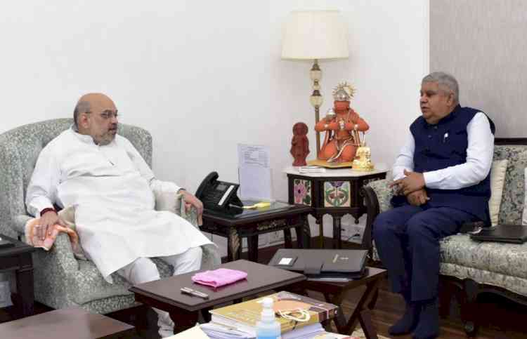 WB Guv meets Amit Shah, briefs him on ground situation in the state