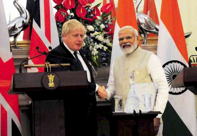 Modi congratulates Johnson for successfully organising COP 26 last year