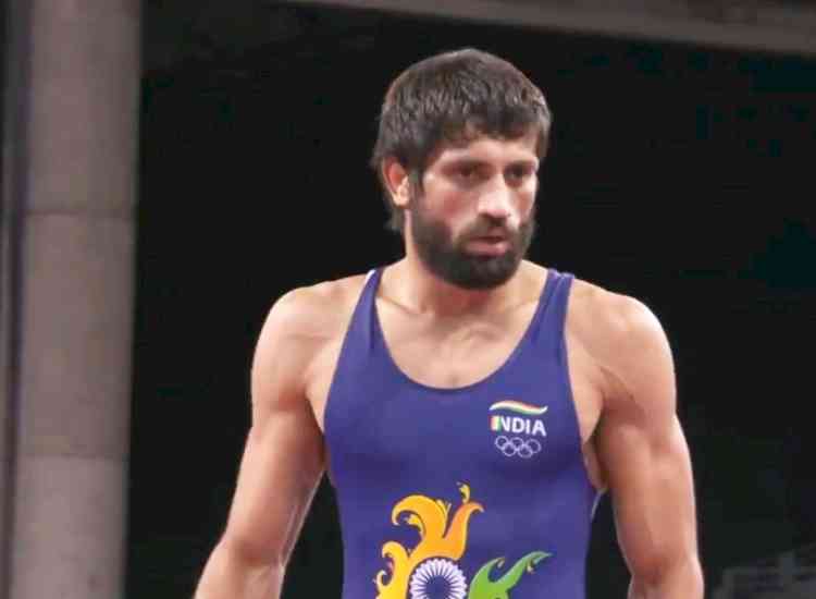 Asian Wrestling C'ships: Ravi Dahiya clinches gold, Bajrang Punia bags silver