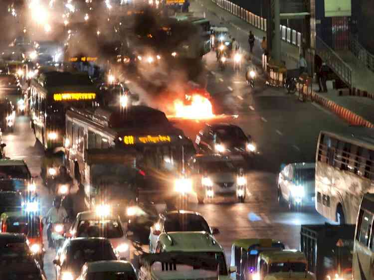 Delhi: Car catches fire on Akshardham flyover