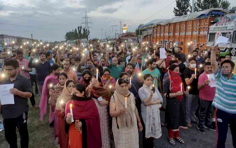 Candlelight protests in Kashmir against killings of innocent people