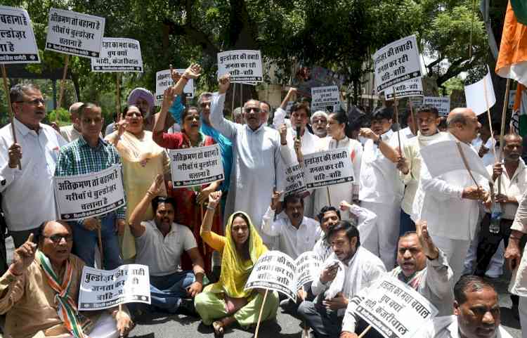 Delhi Congress protests outside BJP HQ over anti-encroachment drives