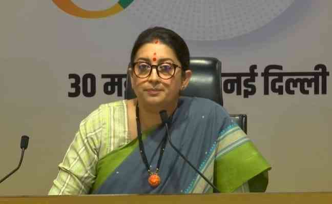Cong leaders on streets to save Gandhi family's assets: Smriti Irani