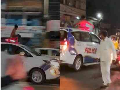 Drunk man hops on to moving police vehicle in Hyderabad