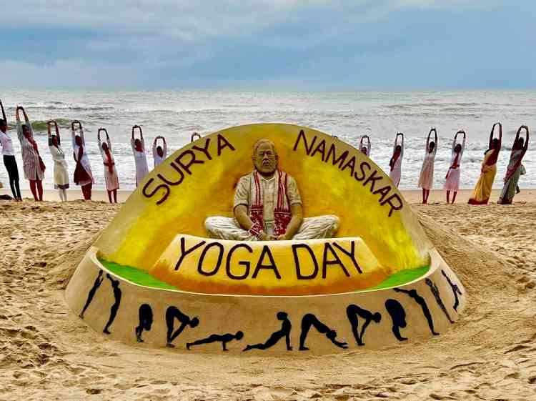 Sudarshan Pattnaik creates Modi's sand sculpture on Yoga Day eve