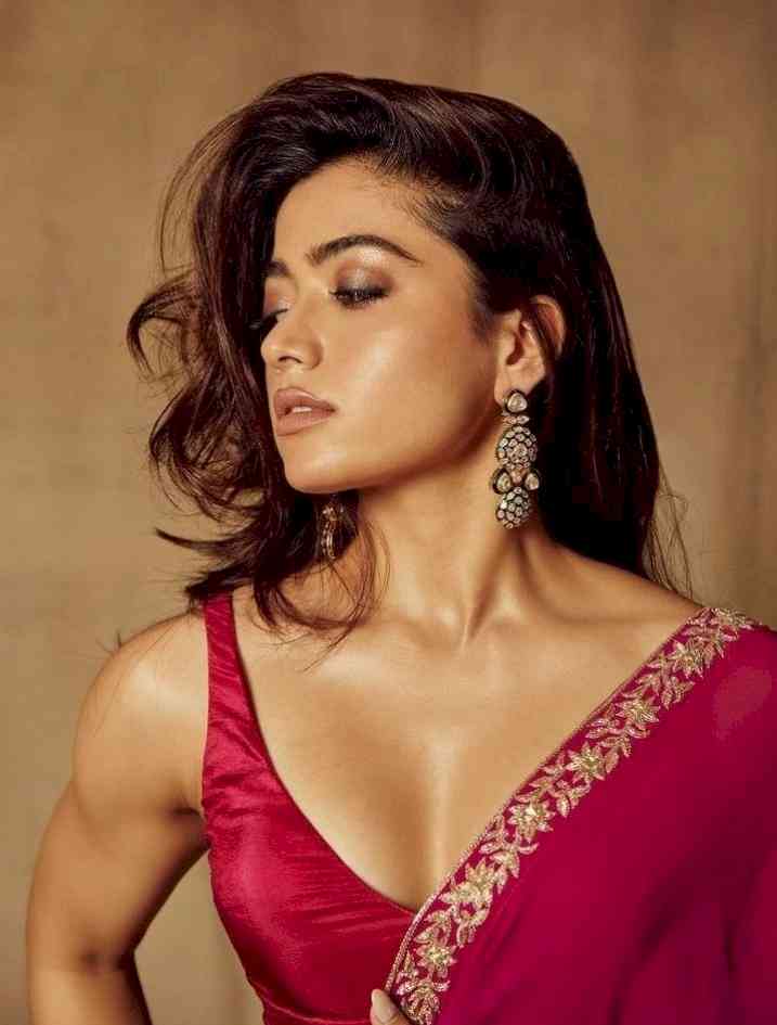 Rashmika sends Netizens into a tizzy as she sizzles in red saree