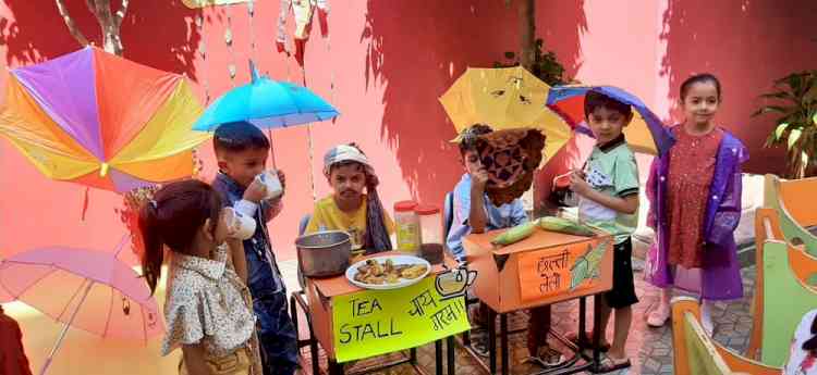 Little kids enjoy monsoon by eating snacks with friends