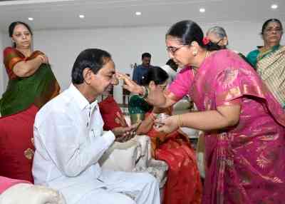 Four sisters tie rakhis to Telangana CM KCR