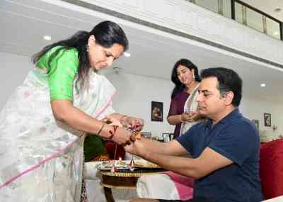 TRS MLC Kavitha ties rakhi to brother KTR